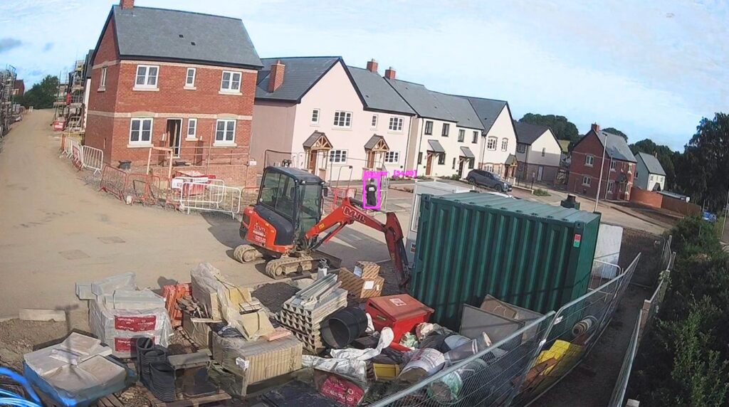 Footage of someone visible on site through a camera.